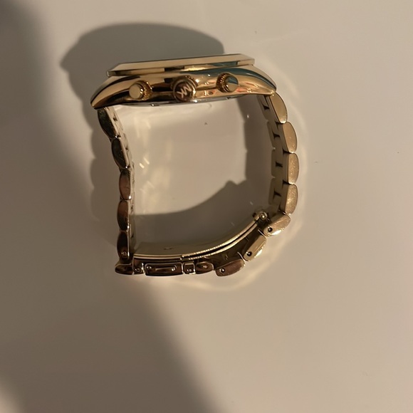 Michael Kors women’s gold watch